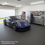 MOT Workshop Floor Tiles - Oil-Resistant Surface installed in warehouse setting