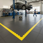 Oil & Chemical Resistant Garage Floor Tiles | 10mm PVC Workshop Flooring Diesel Proof | Acid & Solvent Safe Industrial UK installed in workshop setting