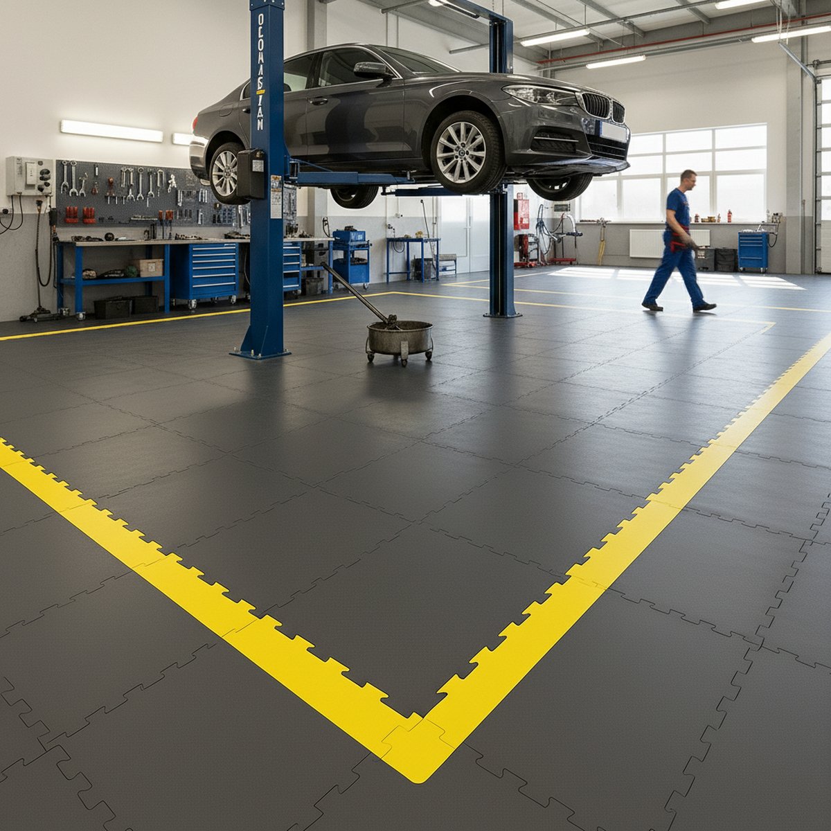 Oil & Chemical Resistant Garage Floor Tiles | 10mm PVC Workshop Flooring Diesel Proof | Acid & Solvent Safe Industrial UK installed in workshop setting